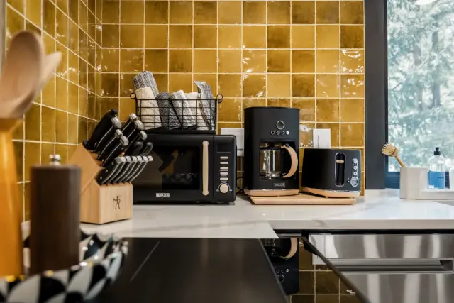 Restocked guest supplies in a vacation rental kitchen